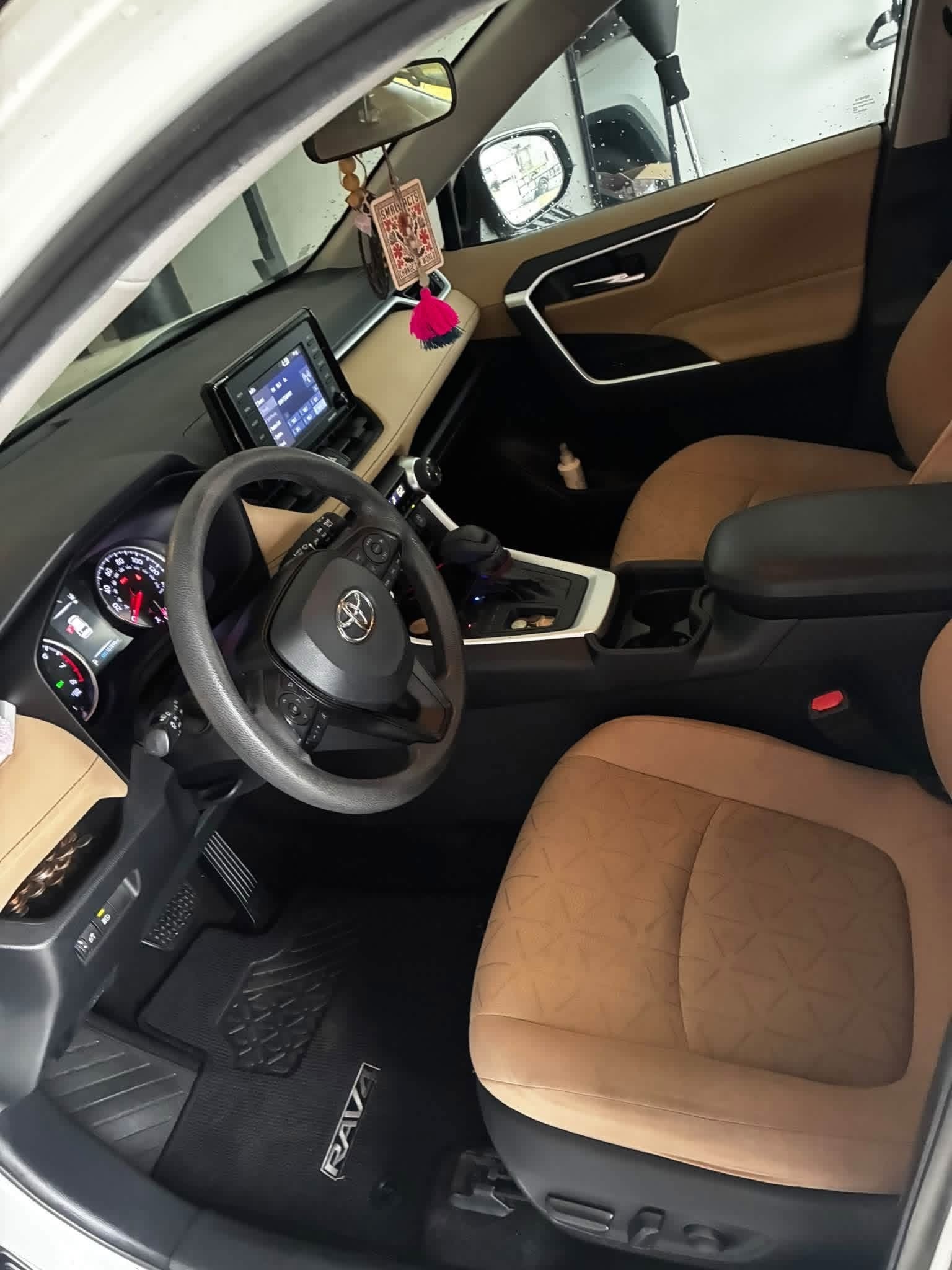 Toyota RAV4 interior after detail — clean steering wheel