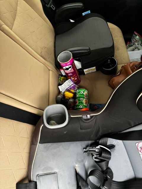 Toyota RAV4 interior before detail — cluttered front