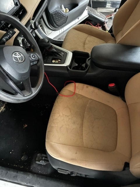 Toyota RAV4 interior before detail — driver seat stains